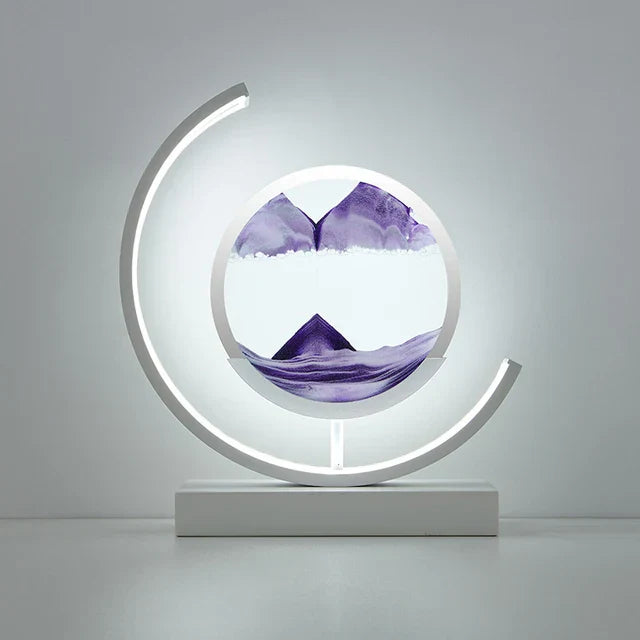 LED table lamp with quicksand effect