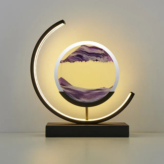 LED table lamp with quicksand effect