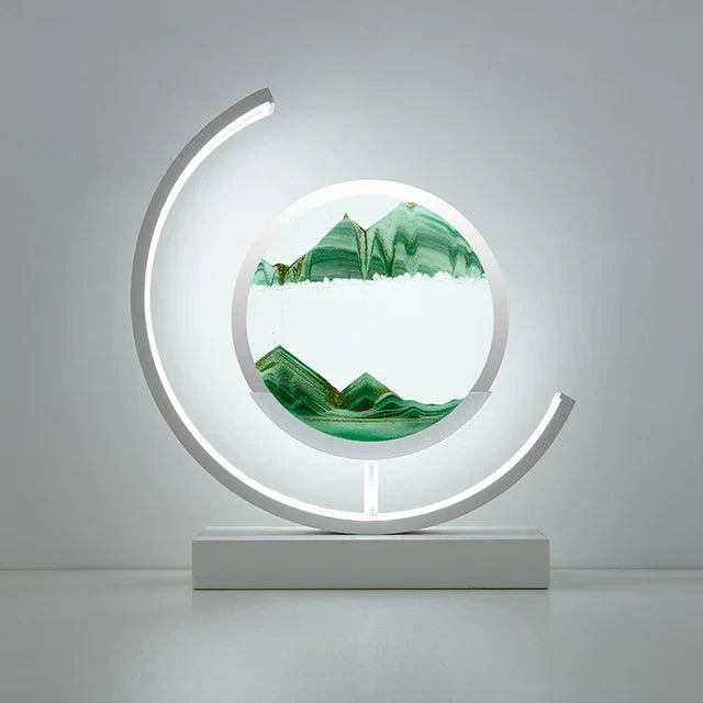 LED table lamp with quicksand effect