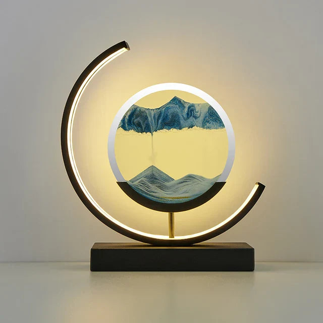 LED table lamp with quicksand effect