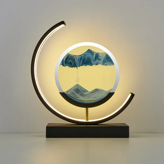 LED table lamp with quicksand effect