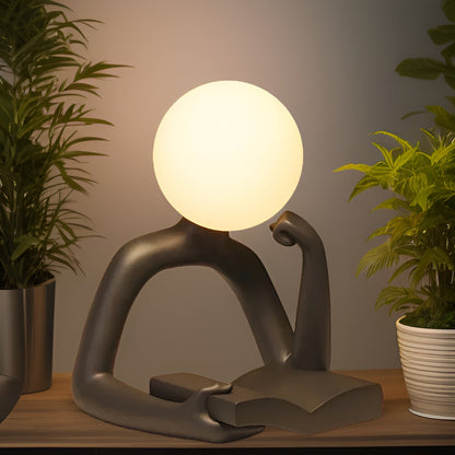 MuseMoon Statue – Denkfigur mit Mondkugel
