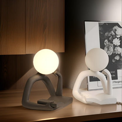 MuseMoon Statue – Denkfigur mit Mondkugel